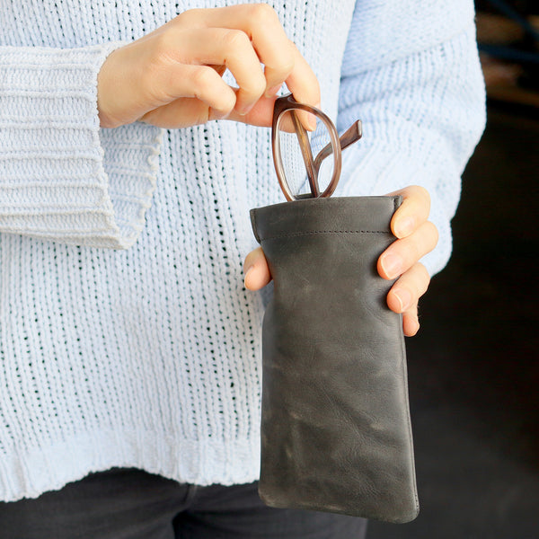 Glasses case being held